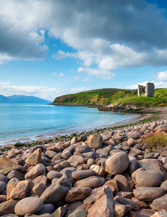 The ancient ruins of Minard Castle overlooking Kilmurry Bay